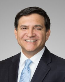 Mark E. Macias