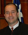 John P. Devine